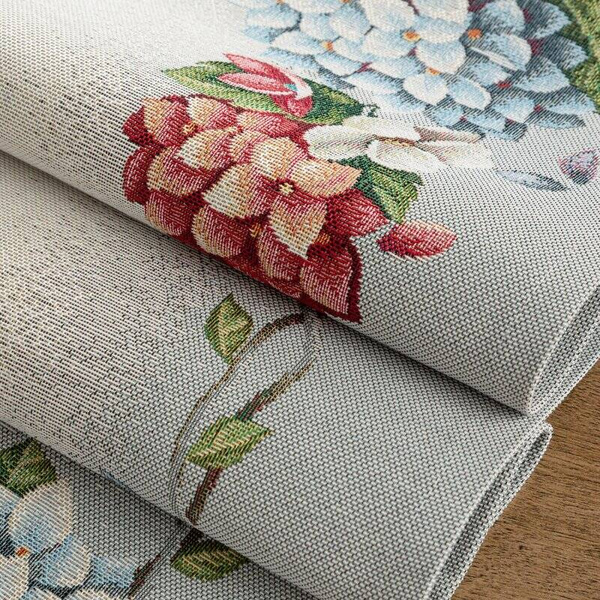 Goblen nadstolnjak ukrašen tkanim cvjetnim motivom 