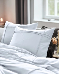 Set posteljine od mikrovlakana dimenzija 240x220 s efektom pranja i prošivenim volanima. Washed Tufted