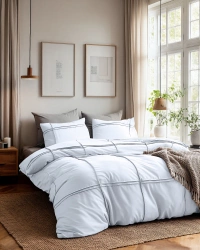 Set posteljine od mikrovlakana dimenzija 240x220 s efektom pranja i prošivenim volanima. Washed Tufted