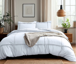 Set posteljine od mikrovlakana dimenzija 240x220 s efektom pranja i prošivenim volanima. Washed Tufted